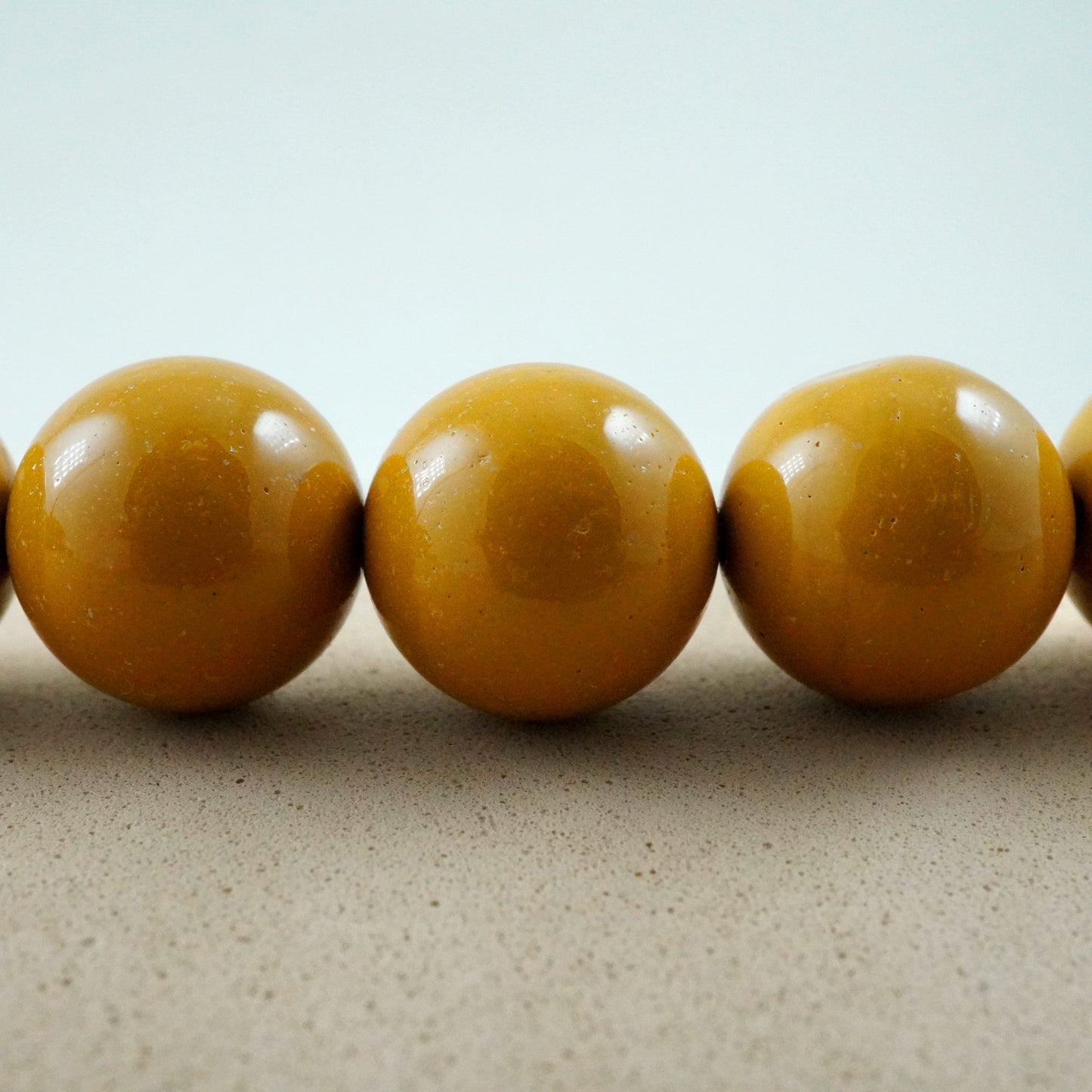Yellow Mookaite (Round)(Smooth)(4mm)(6mm)(8mm)(10mm)(16"Strand)