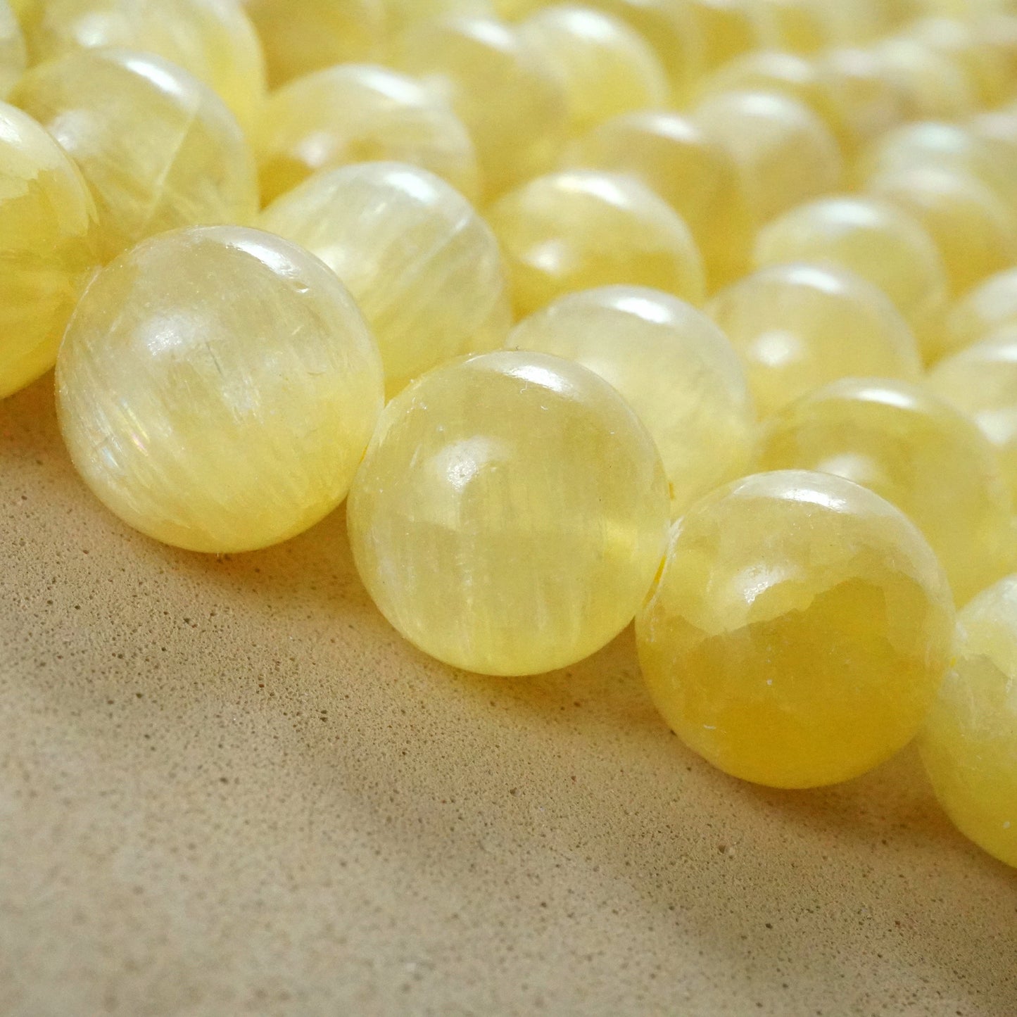 Golden Selenite (Round)(Smooth)(6mm)(8mm)(10mm)(16"Strand)
