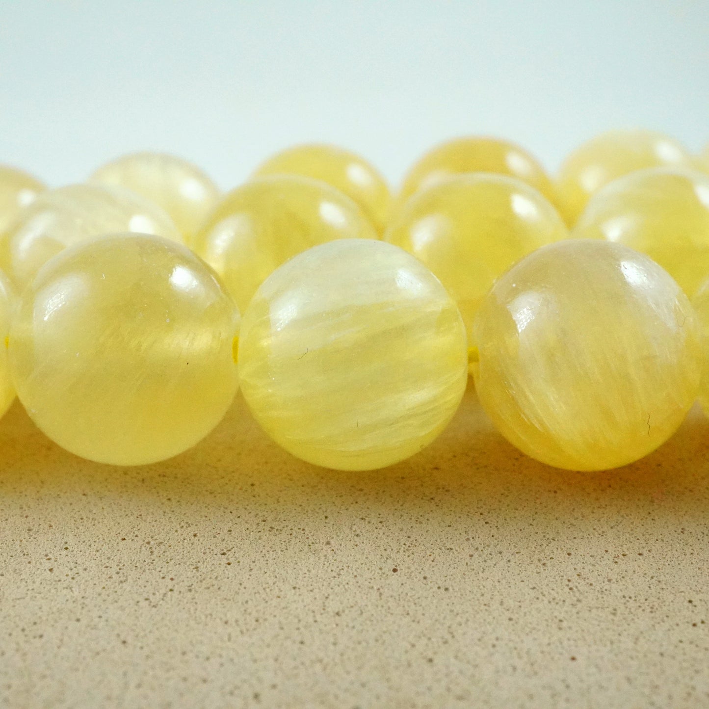 Golden Selenite (Round)(Smooth)(6mm)(8mm)(10mm)(16"Strand)