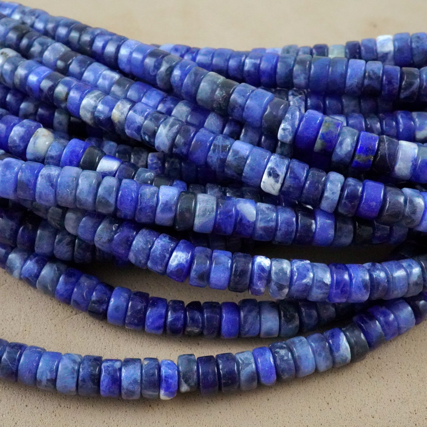 Sodalite (Heishe)(Smooth)(4mm)(15"Strand)