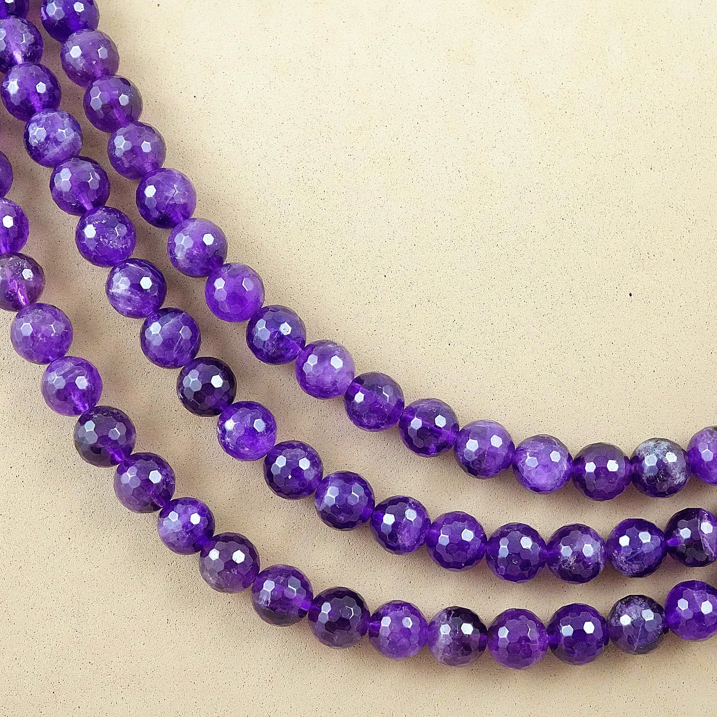 Amethyst (Round)(Faceted)(4mm)(6mm)(8mm)(10mm)(16"Strand)