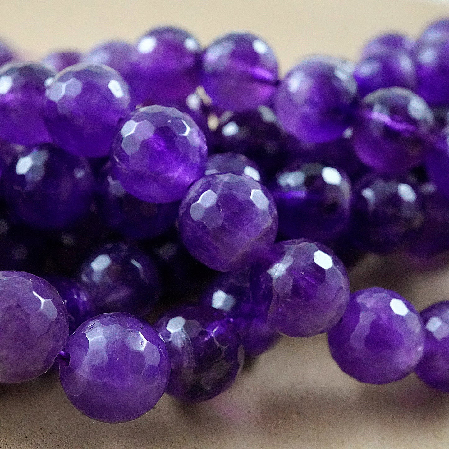 Amethyst (Round)(Faceted)(4mm)(6mm)(8mm)(10mm)(16"Strand)