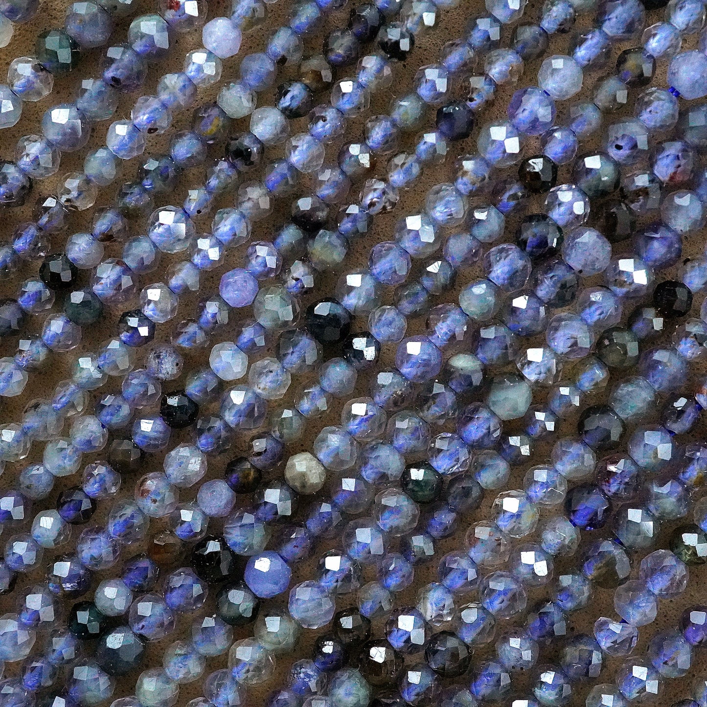 Iolite (Round)(Micro)(Faceted)(2.5mm)(15.5"Strand)