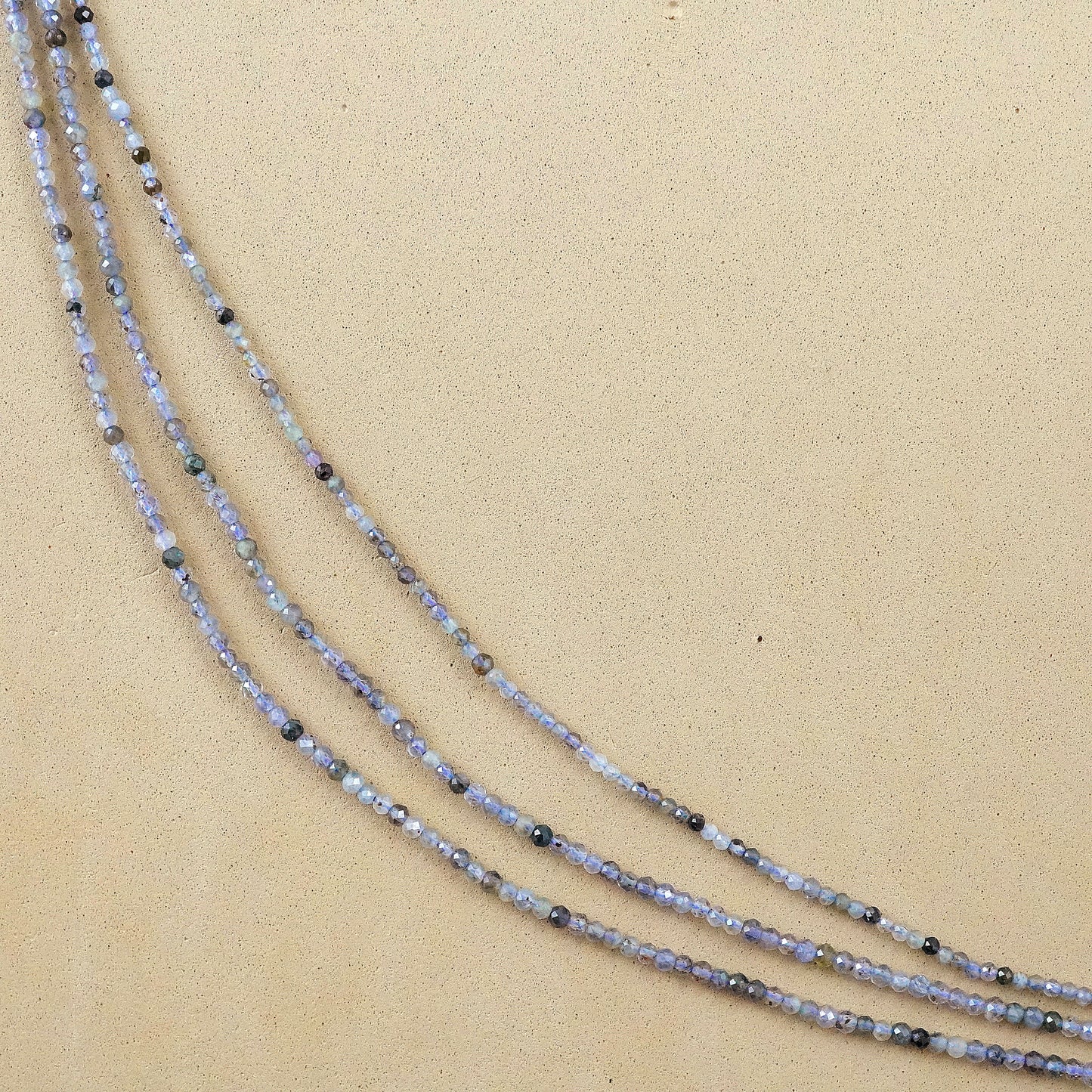 Iolite (Round)(Micro)(Faceted)(2.5mm)(15.5"Strand)