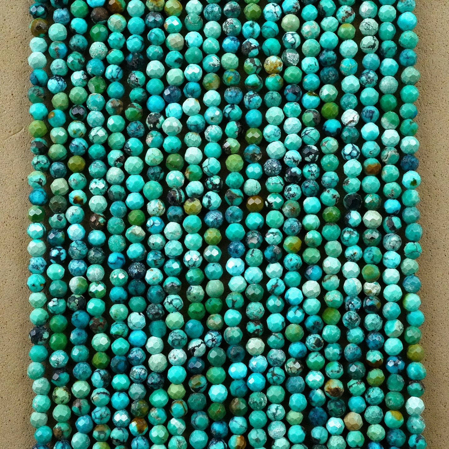 Turquoise (Round)(Micro)(Faceted)(Medium-Grade)(2mm)(2.5mm)(15"Strand)