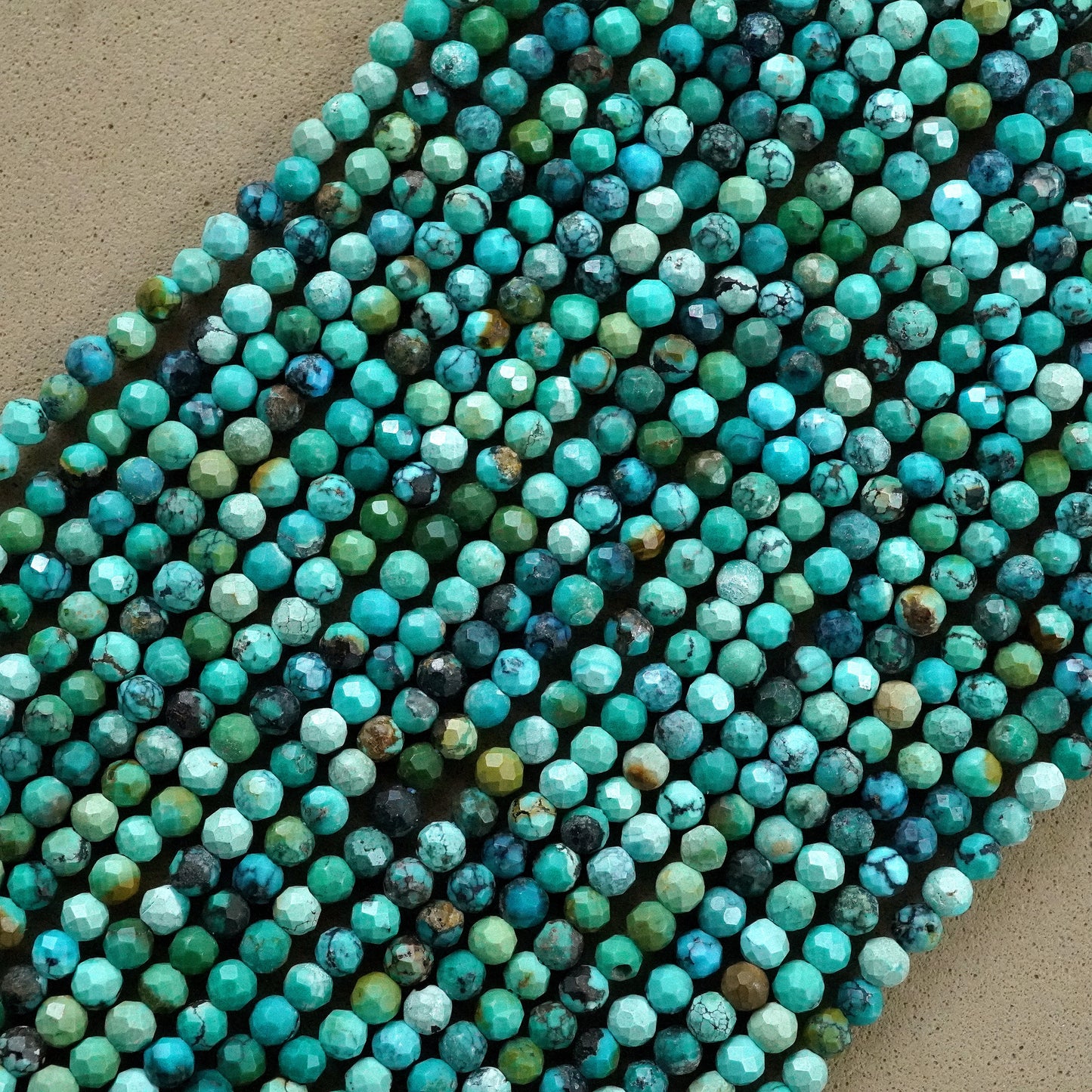 Turquoise (Round)(Micro)(Faceted)(Medium-Grade)(2mm)(2.5mm)(15"Strand)