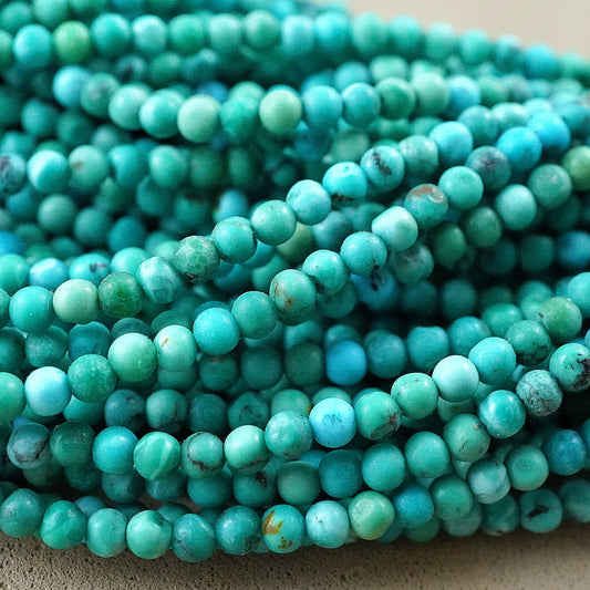 Turquoise (Round)(Smooth)(High Grade)(2mm)(15"Strand)