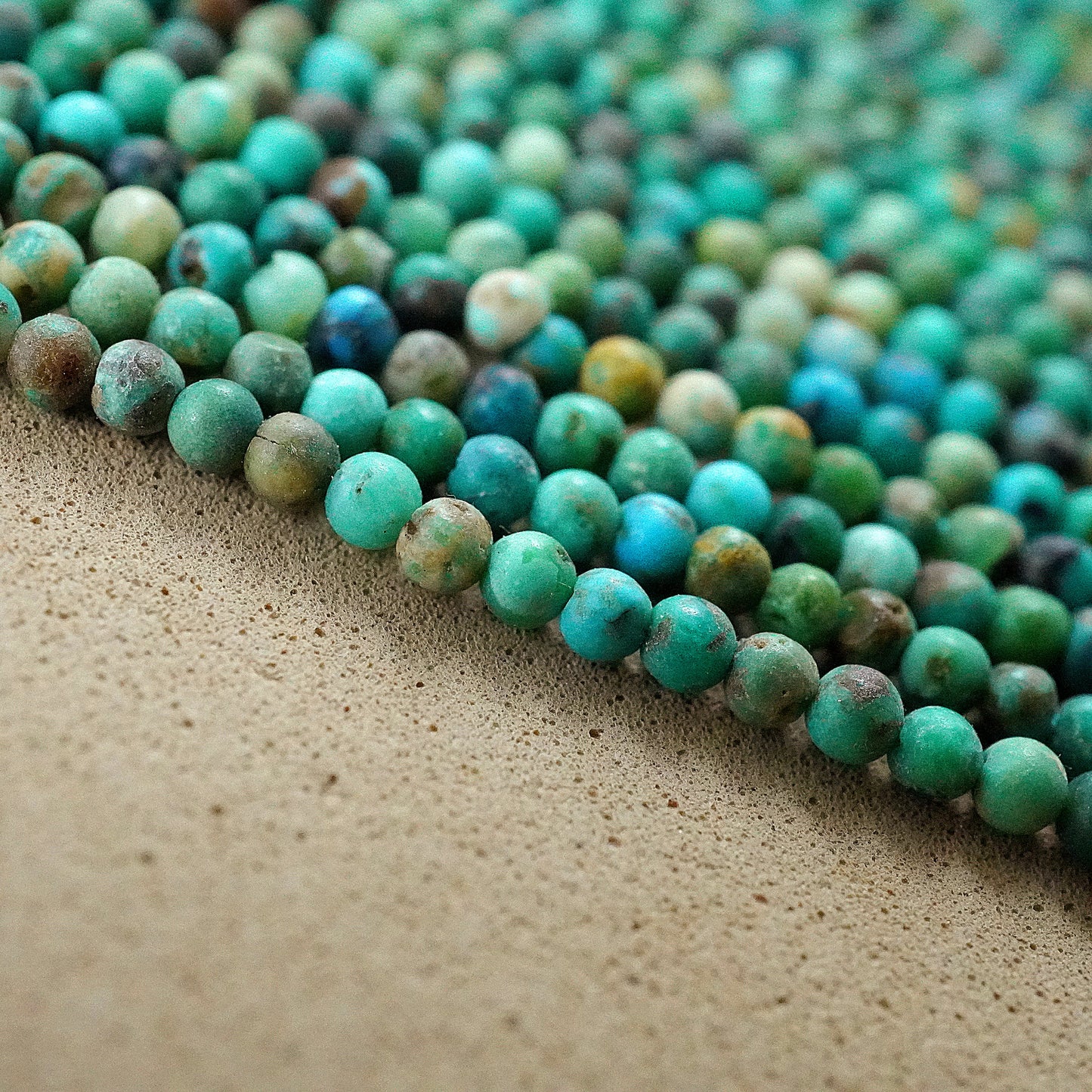 Turquoise (Round)(Smooth)(Medium-Grade)(2mm)(15"Strand)