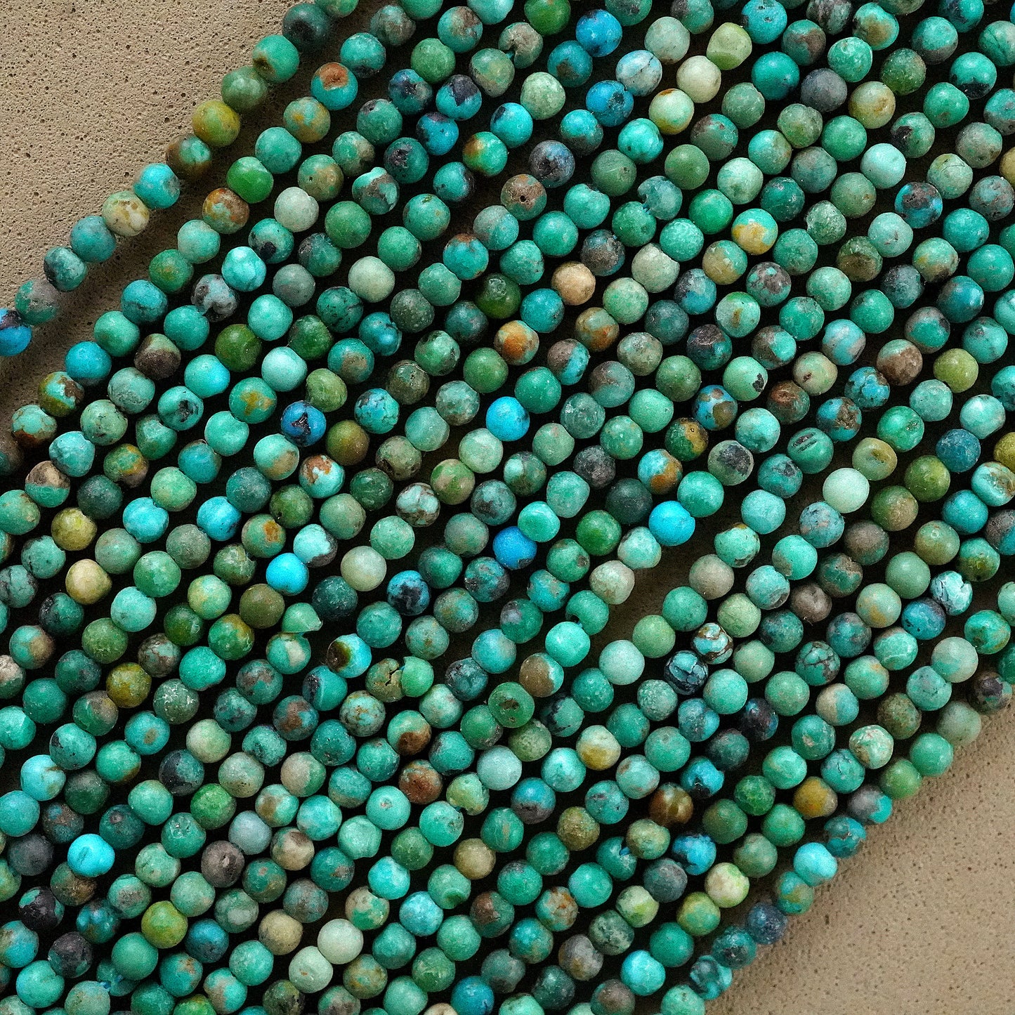 Turquoise (Round)(Smooth)(Medium-Grade)(2mm)(15"Strand)