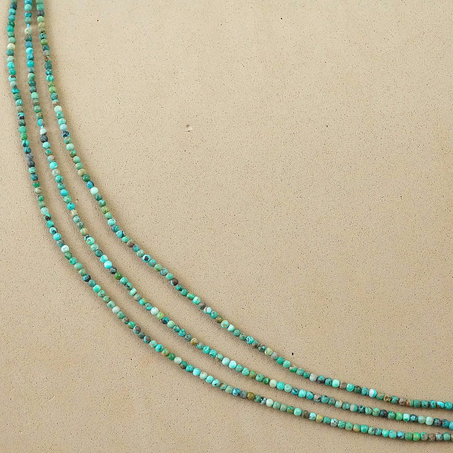 Turquoise (Round)(Smooth)(Medium-Grade)(2mm)(15"Strand)