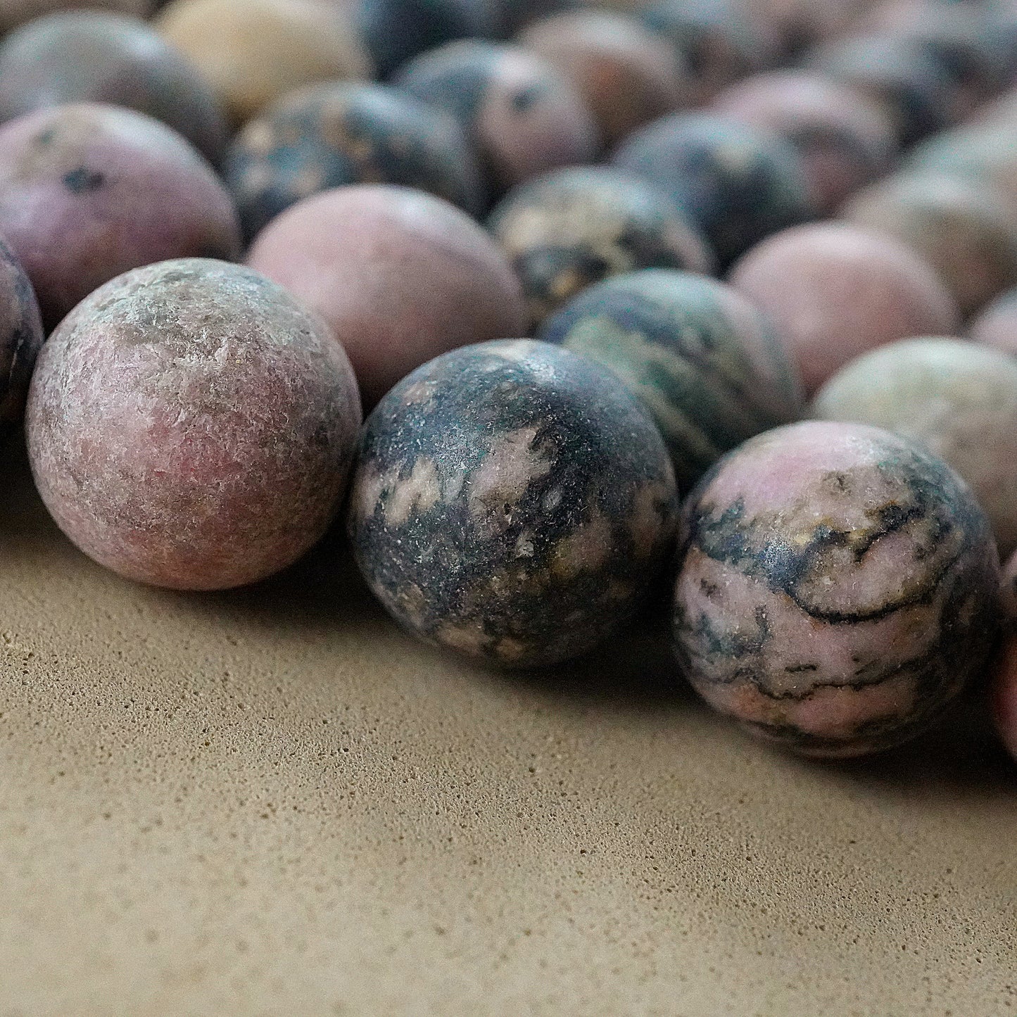 Rhodonite (Round)(Matte)(4mm)(6mm)(8mm)(10mm)(12mm)(16"Strand)