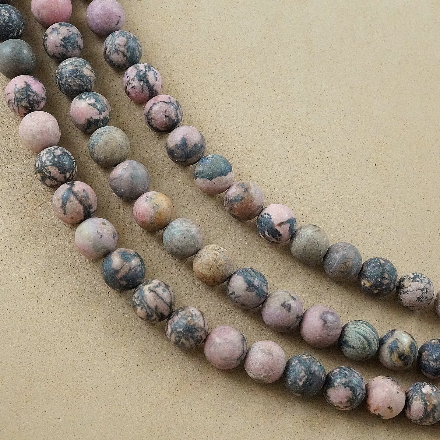 Rhodonite (Round)(Matte)(4mm)(6mm)(8mm)(10mm)(12mm)(16"Strand)