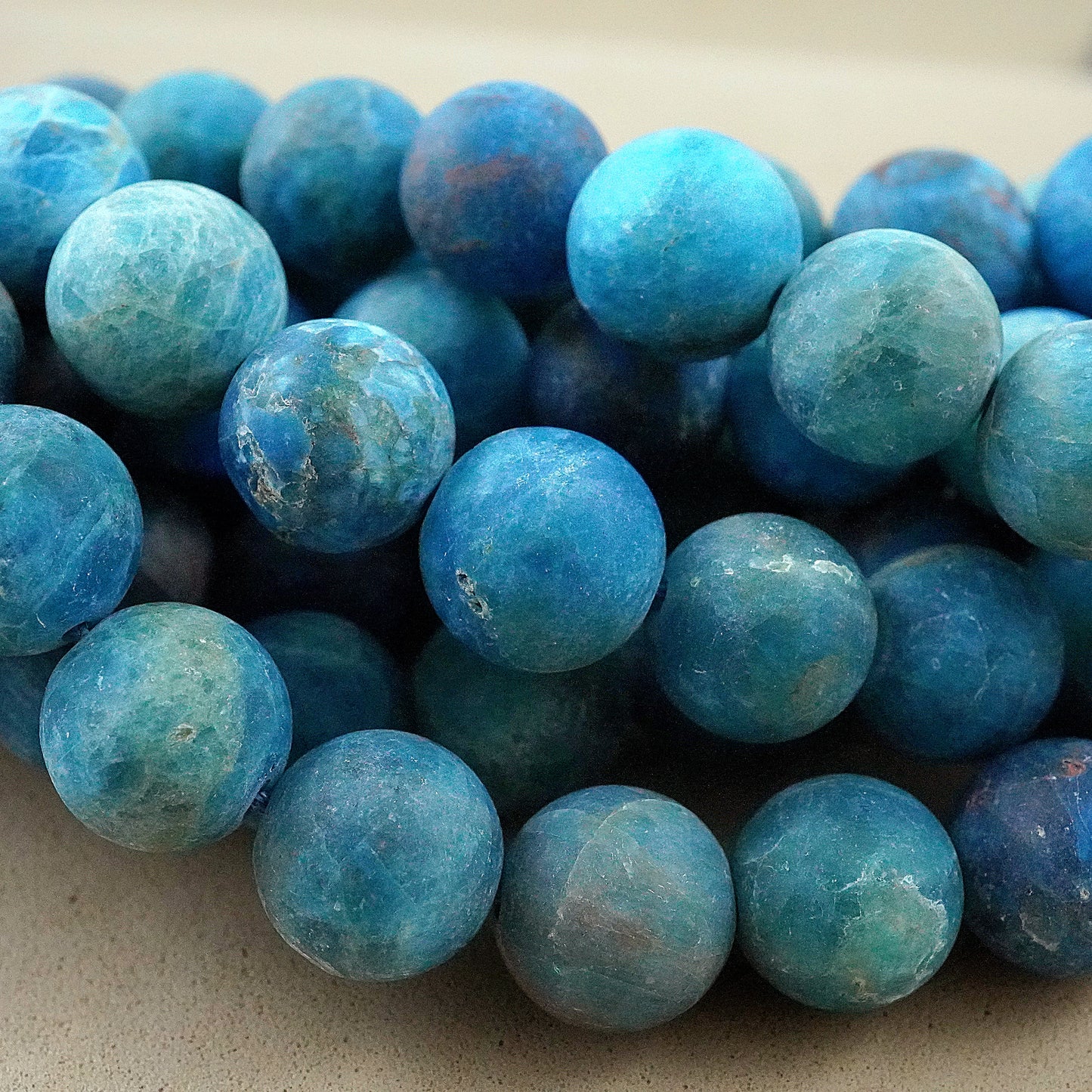 Blue Apatite (Round)(Matte)(4mm)(6mm)(8mm)(10mm)(12mm)(15"Strand)