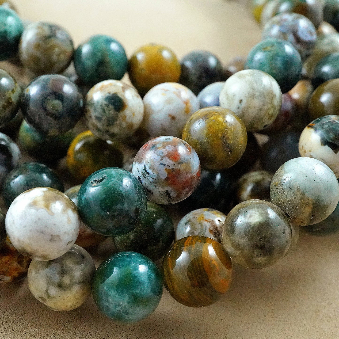 Ocean Jasper (Light)(Round)(Smooth)(6mm)(8mm)(10mm)(16"Strand)