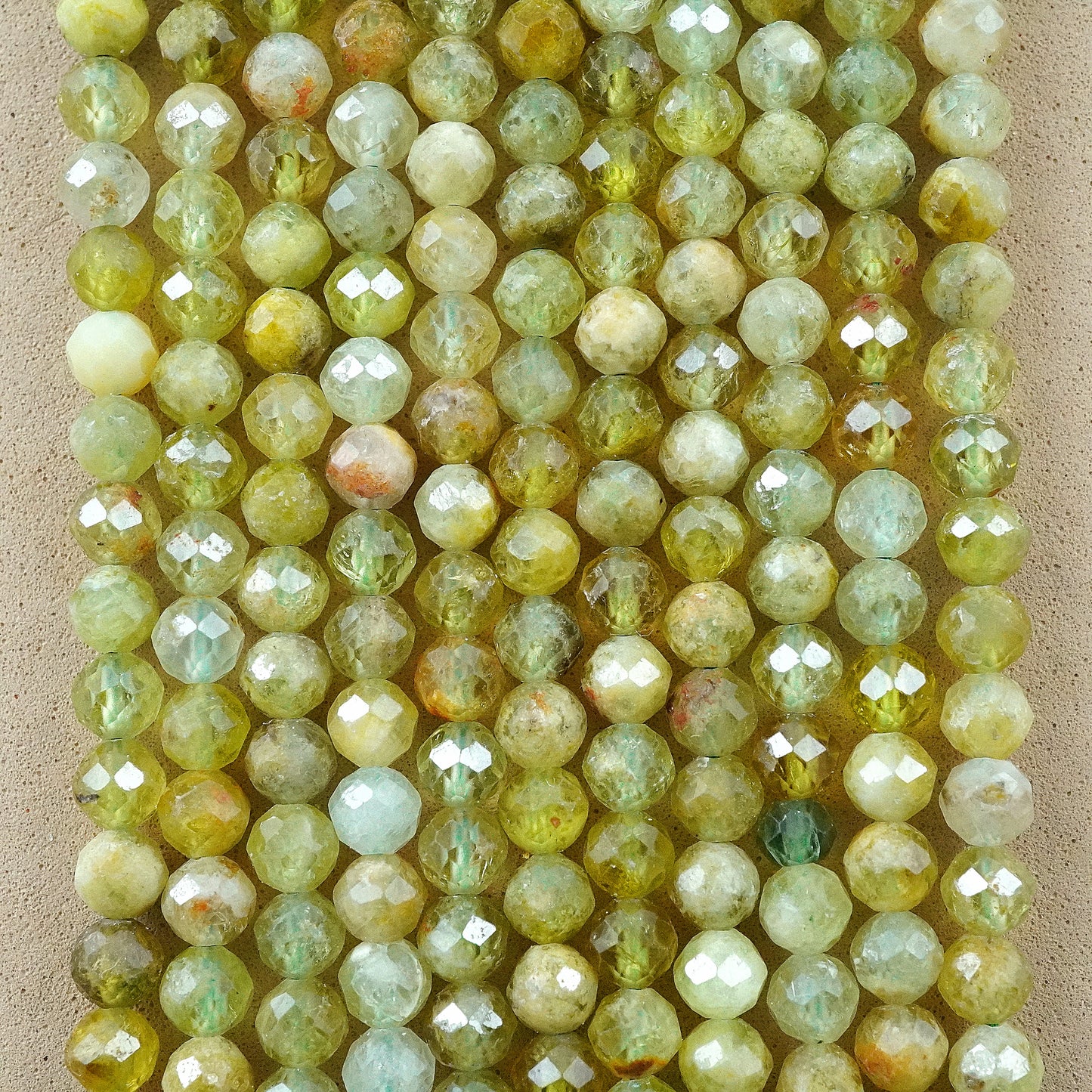 Green Garnet (AA)(Round)(Micro)(Faceted)(4mm)(15"Strand)