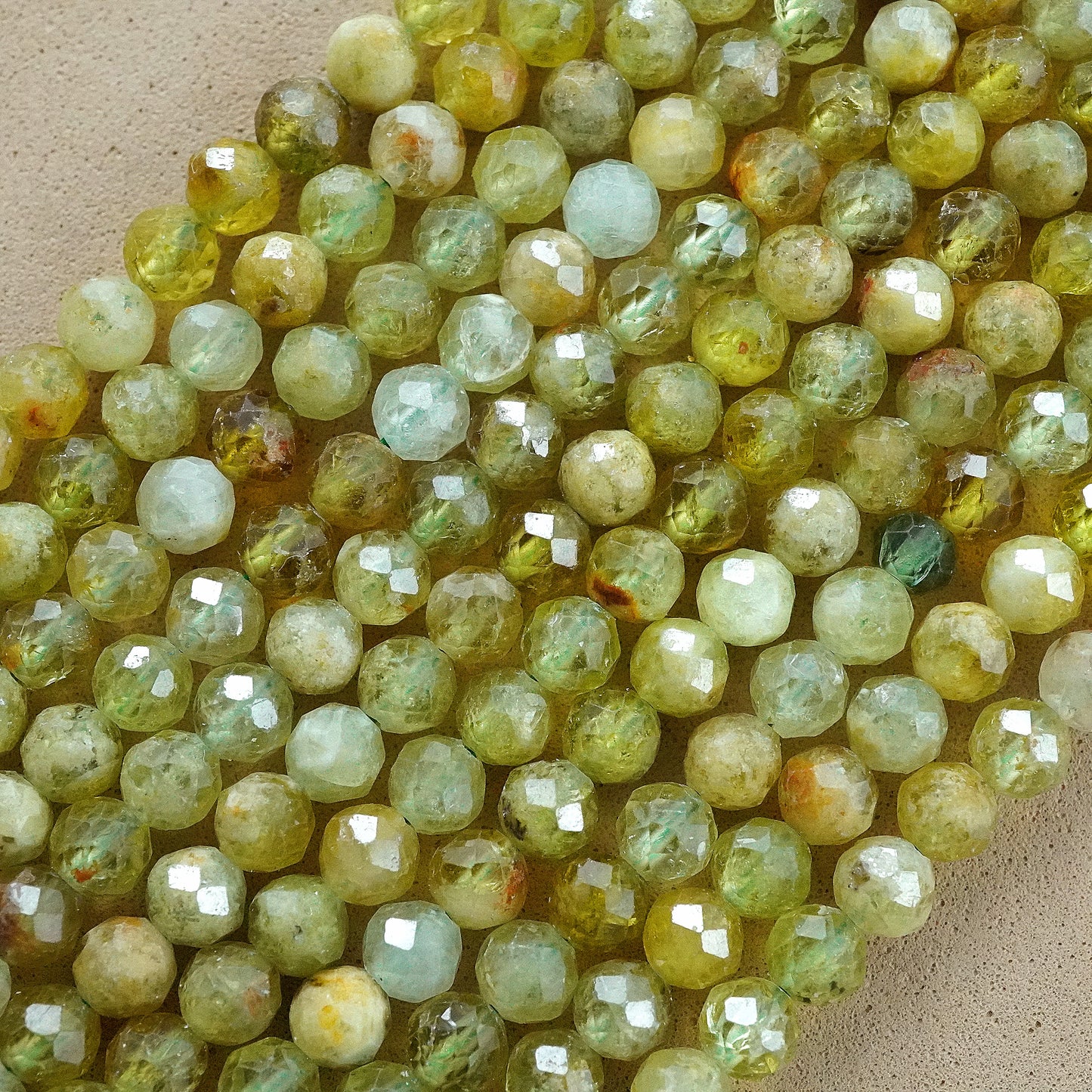 Green Garnet (AA)(Round)(Micro)(Faceted)(4mm)(15"Strand)