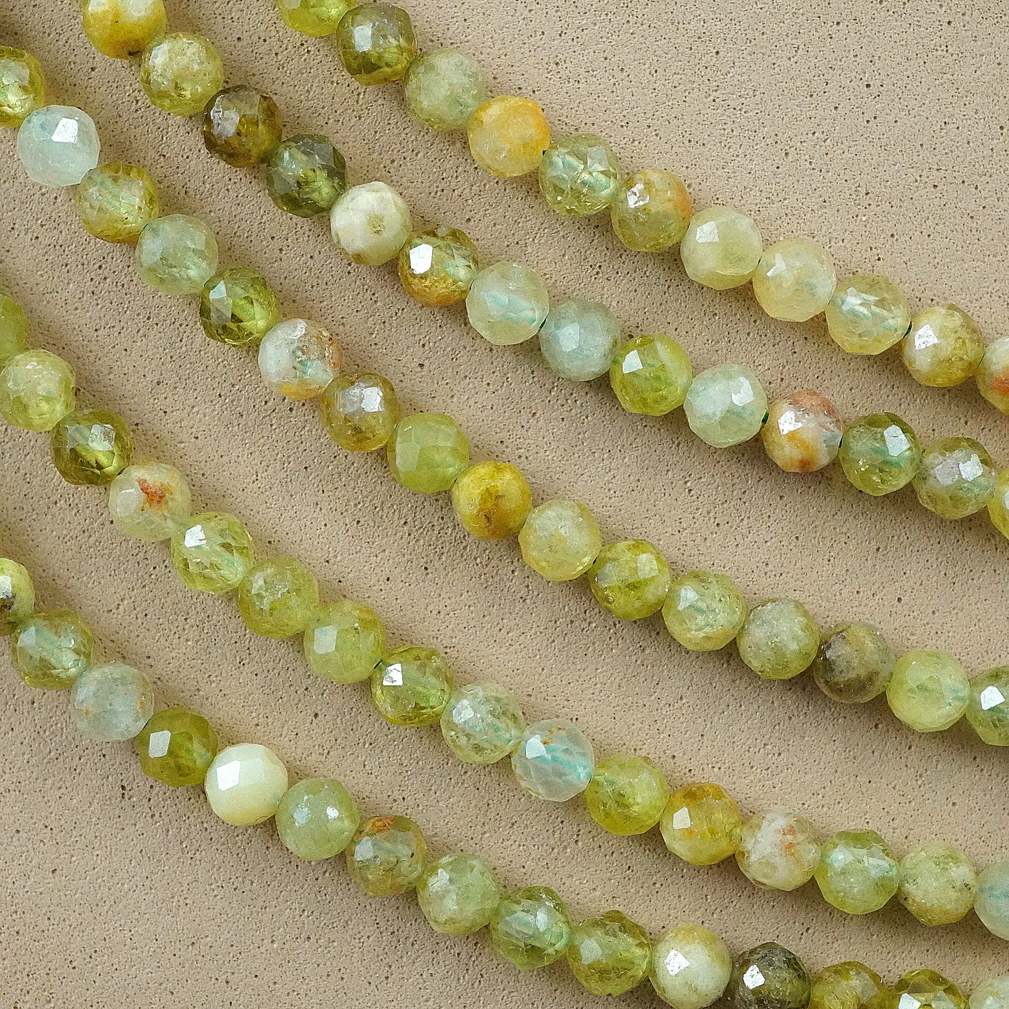 Green Garnet (AA)(Round)(Micro)(Faceted)(4mm)(15"Strand)