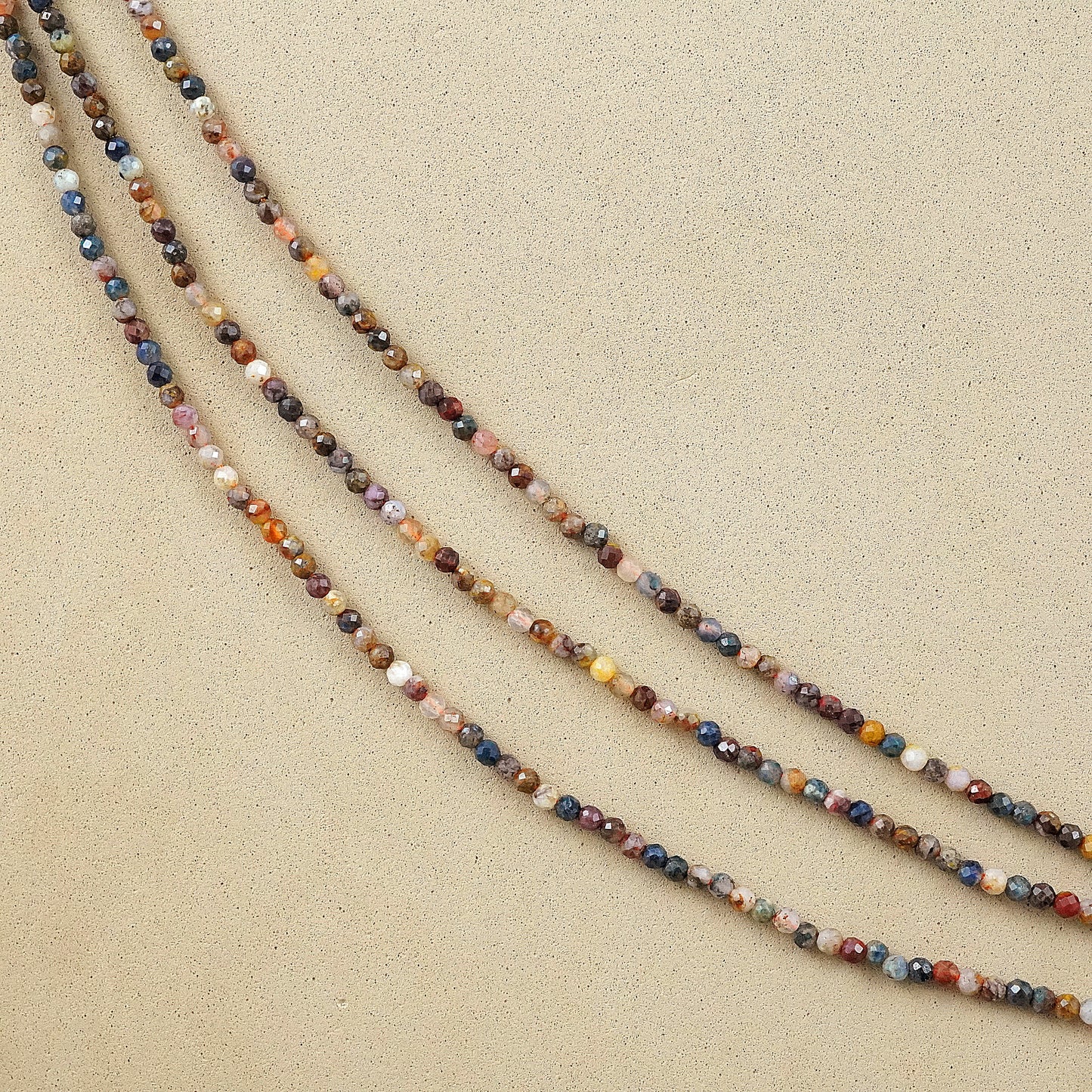 Pietersite in Quartz (Round)(Micro)(Faceted)(2mm)(15"Strand)