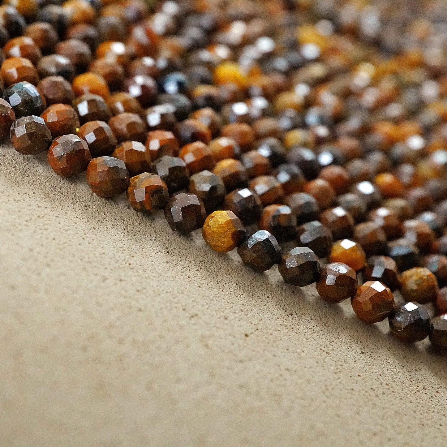 Tiger Eye (Round)(Micro)(Faceted)(2mm)(15"Strand)