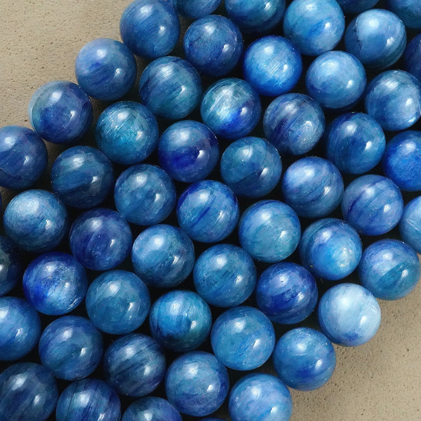 Kyanite (Round)(Smooth)(Blue)(6mm)(8mm)(10mm)(16"Strand)