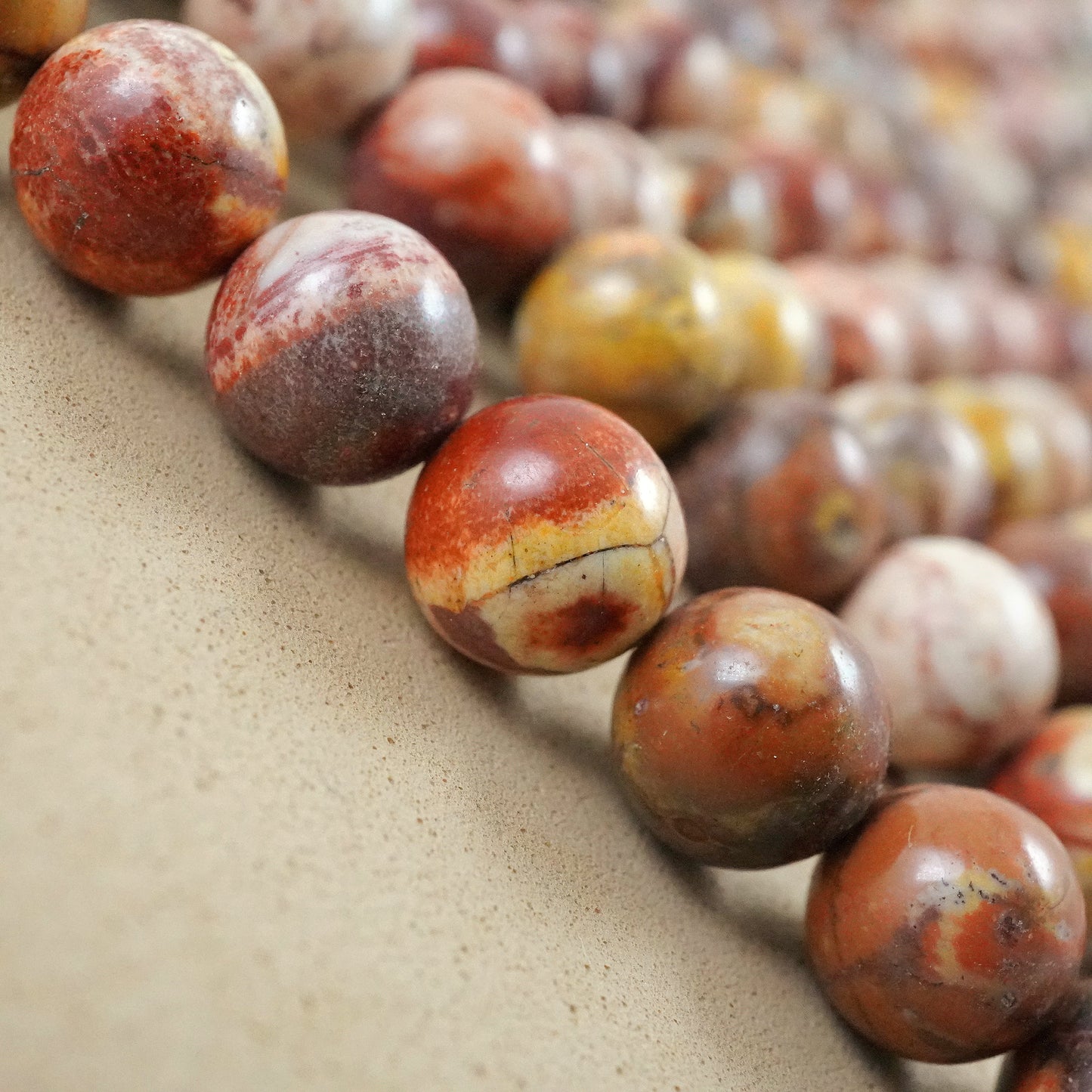 Bird's Eye Rhyolite (Round)(Smooth)(4mm)(6mm)(8mm)(10mm)(15"Strand)