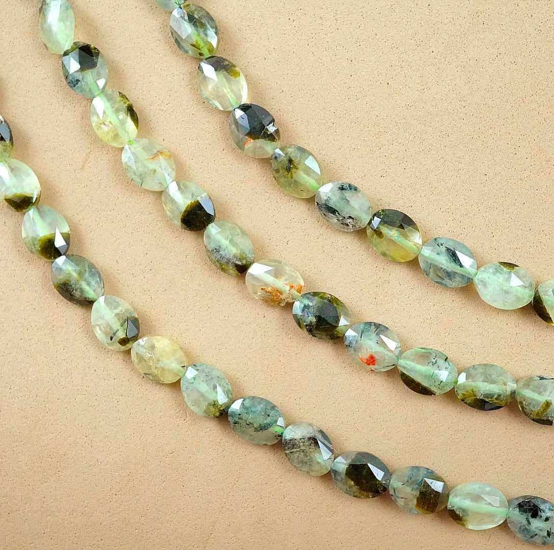 Prehnite (Oval)(Faceted)(8x10mm)(15"Strand)