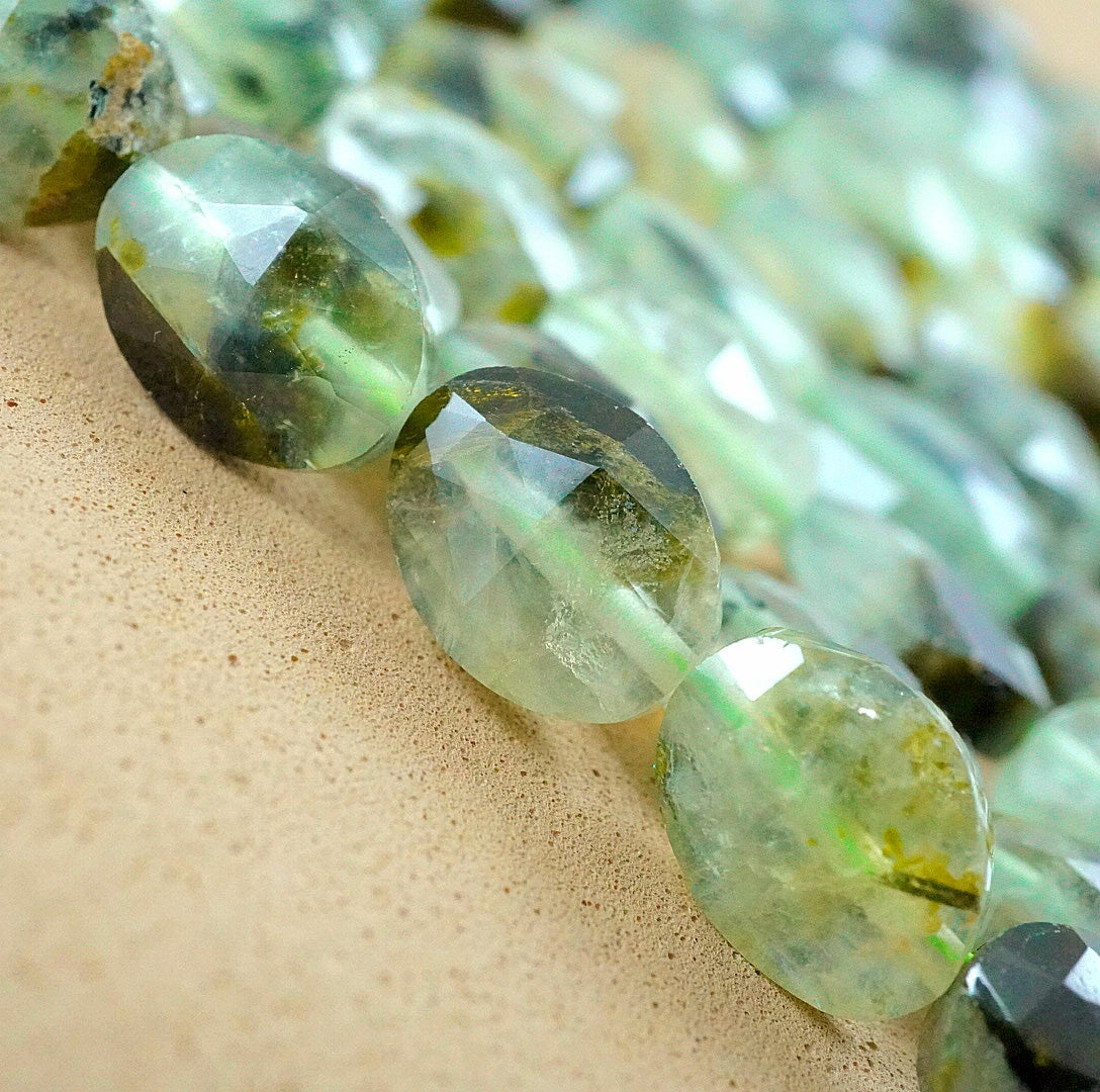 Prehnite (Oval)(Faceted)(8x10mm)(15"Strand)