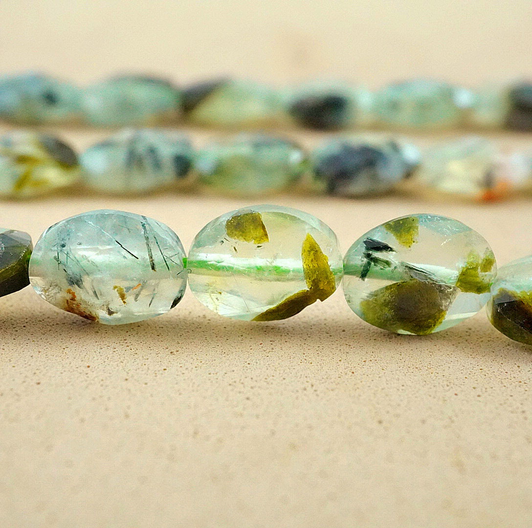 Prehnite (Oval)(Faceted)(8x10mm)(15"Strand)