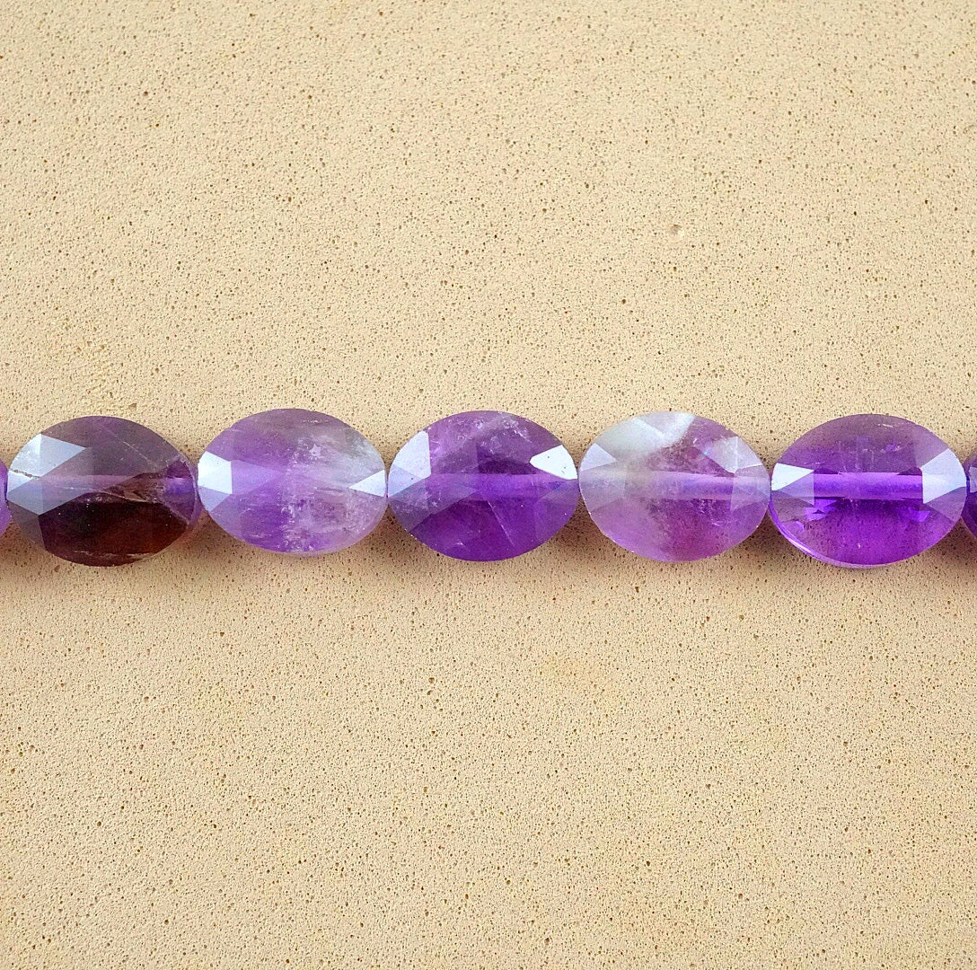 Chevron Amethyst (Oval)(Faceted)(8x10mm)(15"Strand)