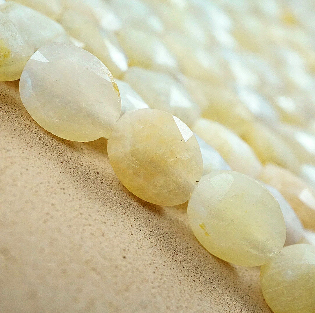 White Moonstone (Oval)(Faceted)(8x10mm)(15"Strand)