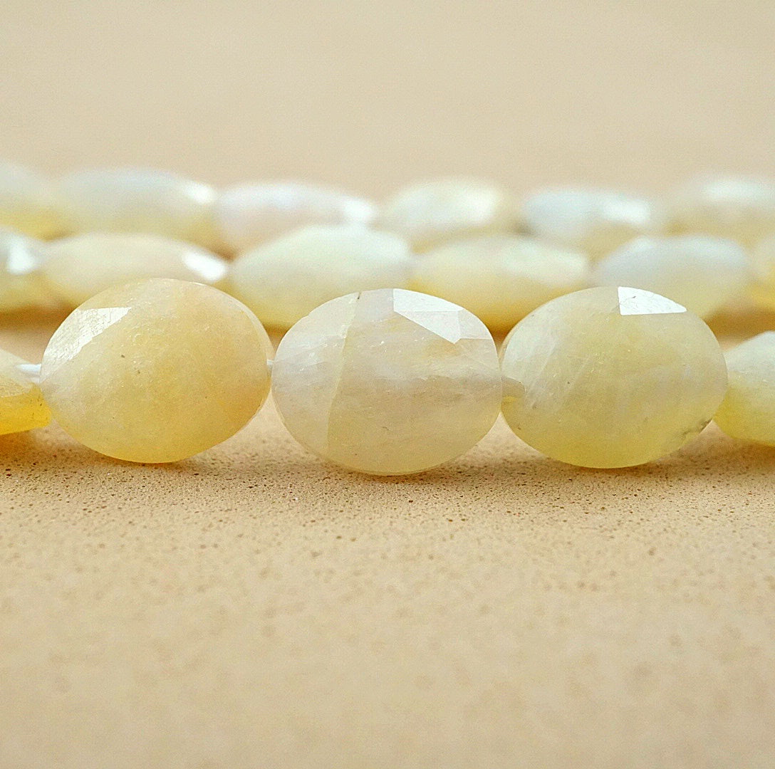 White Moonstone (Oval)(Faceted)(8x10mm)(15"Strand)