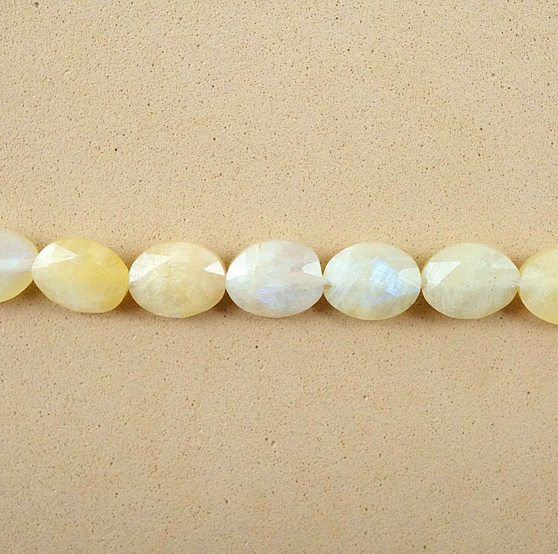 White Moonstone (Oval)(Faceted)(8x10mm)(15"Strand)