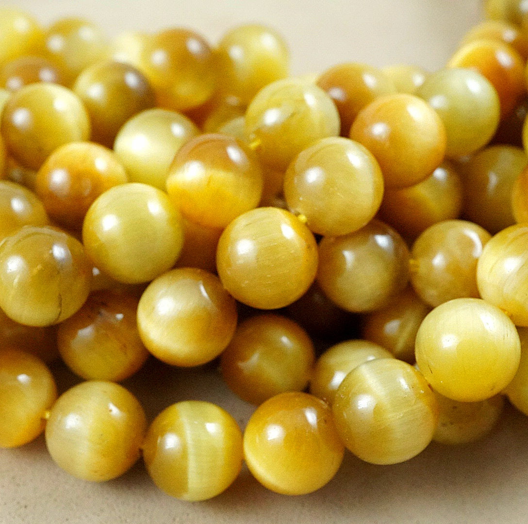 Golden Tiger's Eye (Round)(Smooth)(4mm)(6mm)(8mm)10mm)(12mmm)(16"Strand)