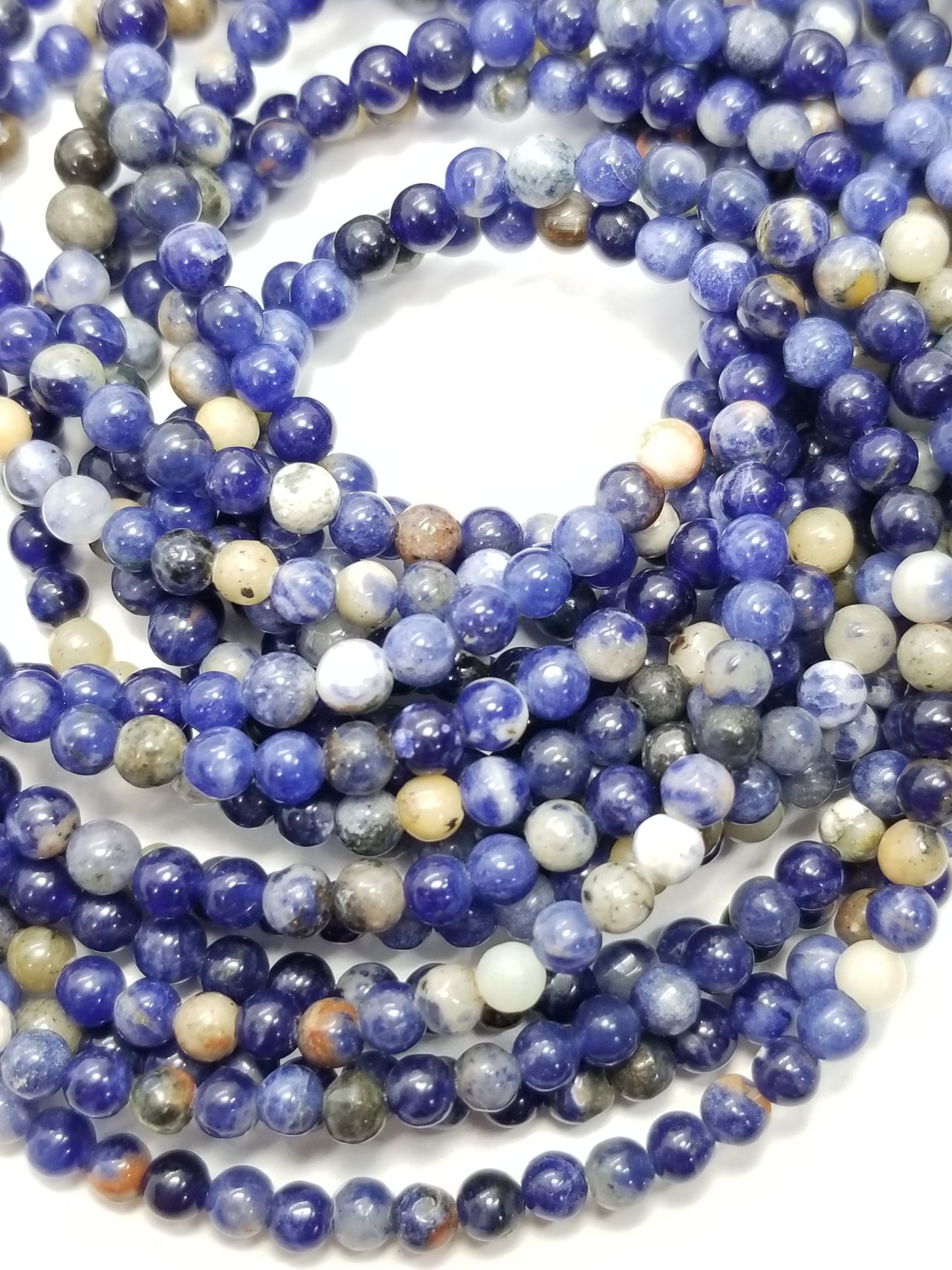 Orange Sodalite (Round)(Smooth)(16"Strand)