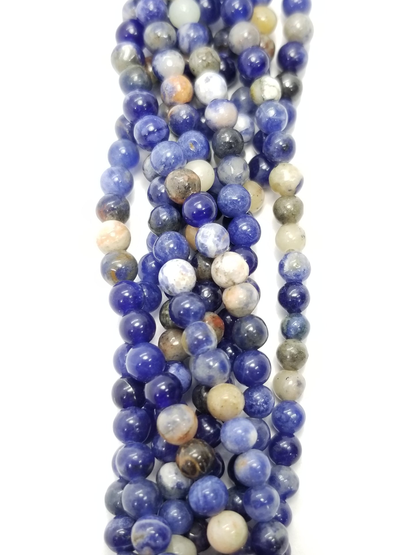 Orange Sodalite (Round)(Smooth)(16"Strand)