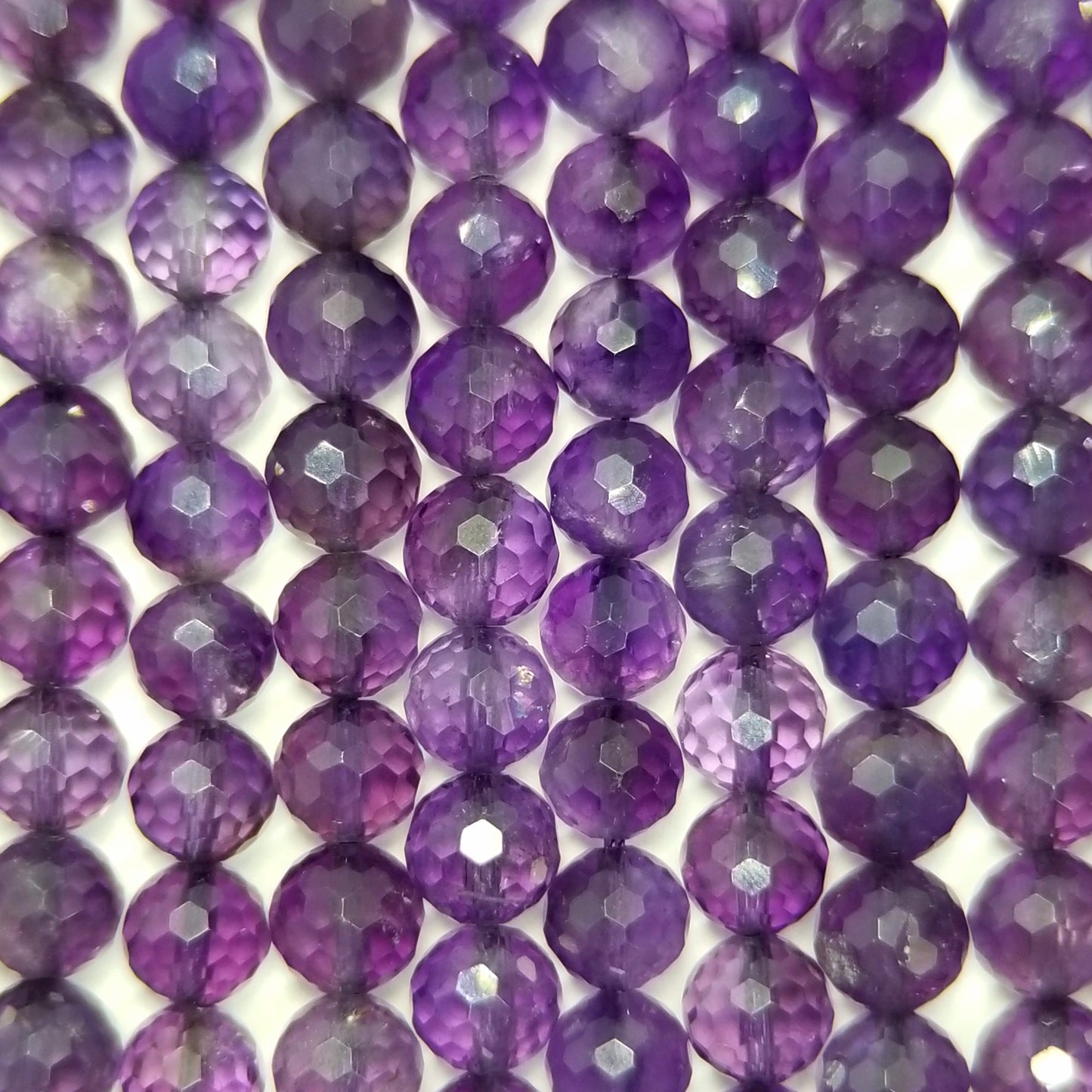 Amethyst (Round)(Faceted)(Premium)(AAA)(16"Strand)