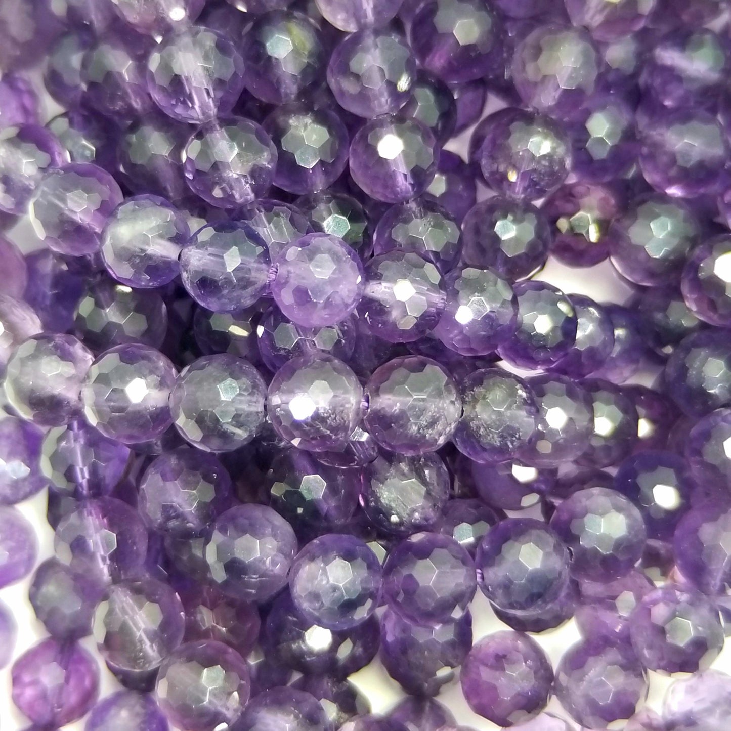 Amethyst (Round)(Faceted)(Premium)(AAA)(16"Strand)