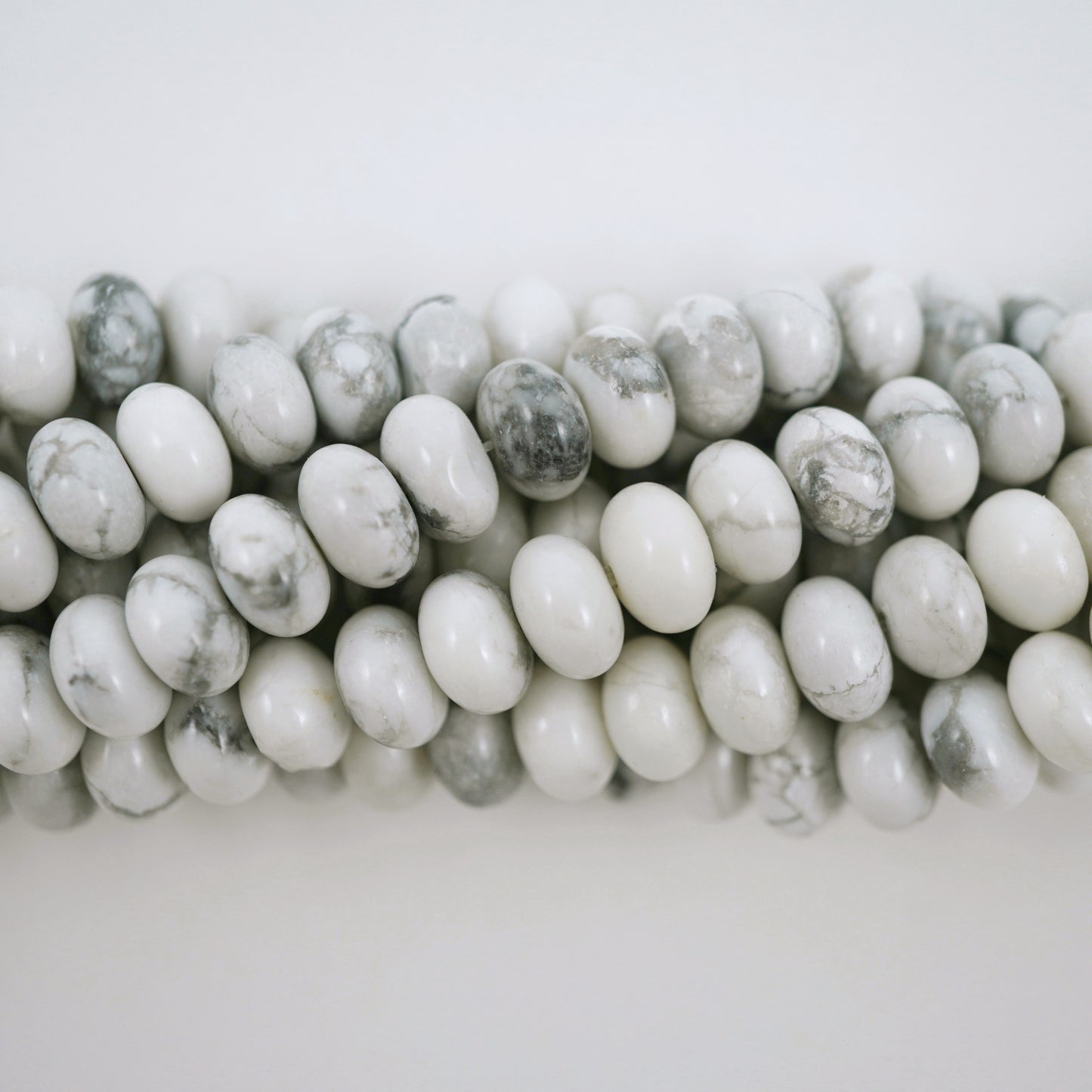 Howlite (Rondelle)(Smooth)(6mm)(8mm)(16"Strand)