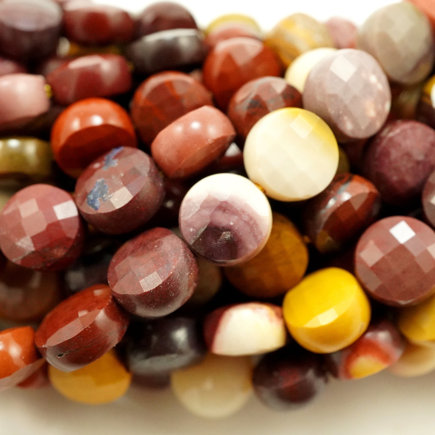 Mookaite (Coin)(Micro)(Faceted)(7×4mm)(15"Strand)