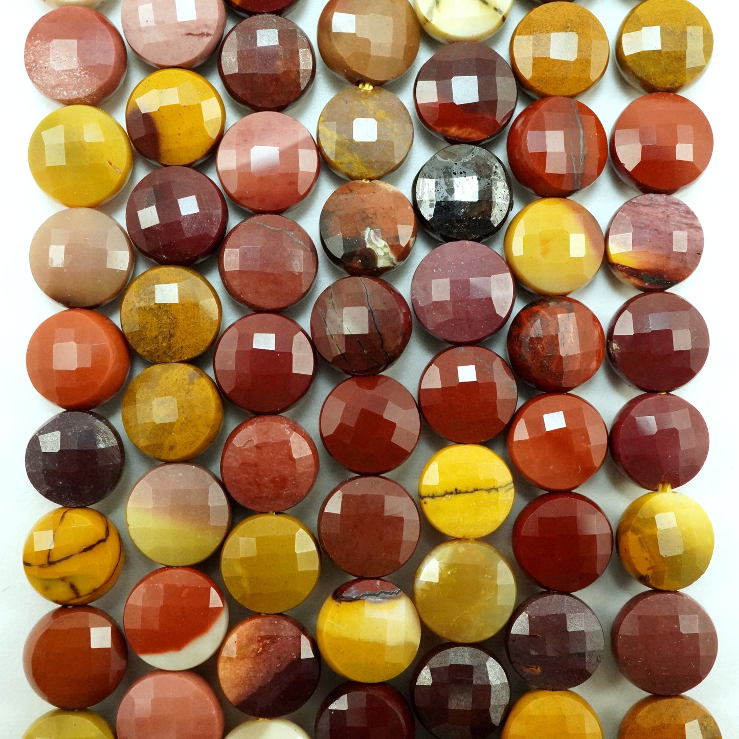 Mookaite (Coin)(Micro)(Faceted)(7×4mm)(15"Strand)