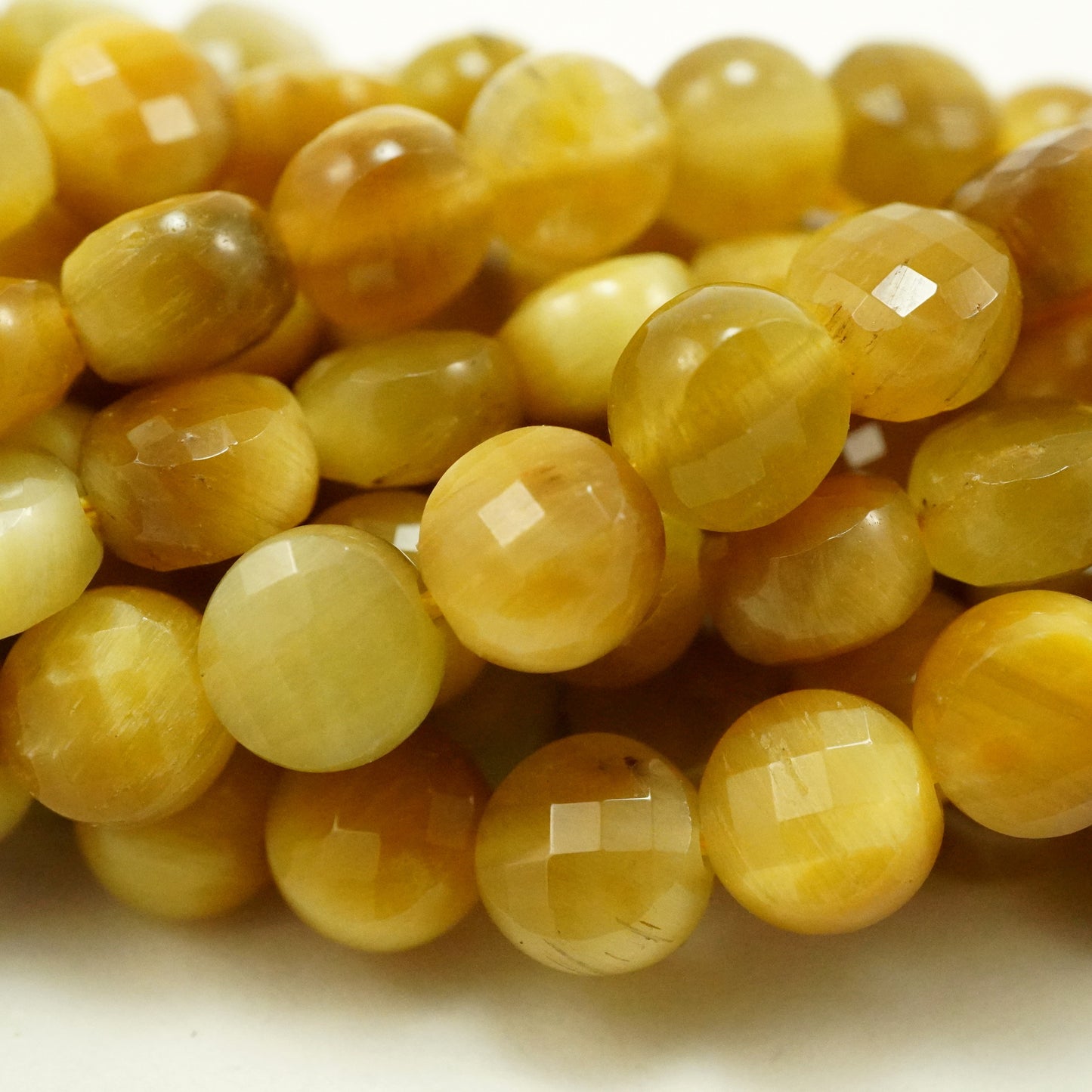 Golden Tiger Eye (Coin)(Micro)(Faceted)(6×4mm)(15.5"Strand)