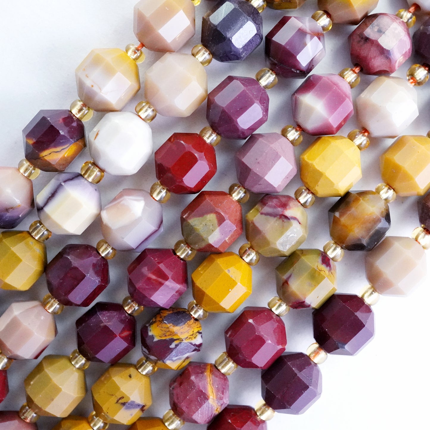 Mookaite (Barrel)(Faceted)(8x7mm)(16"Strand)