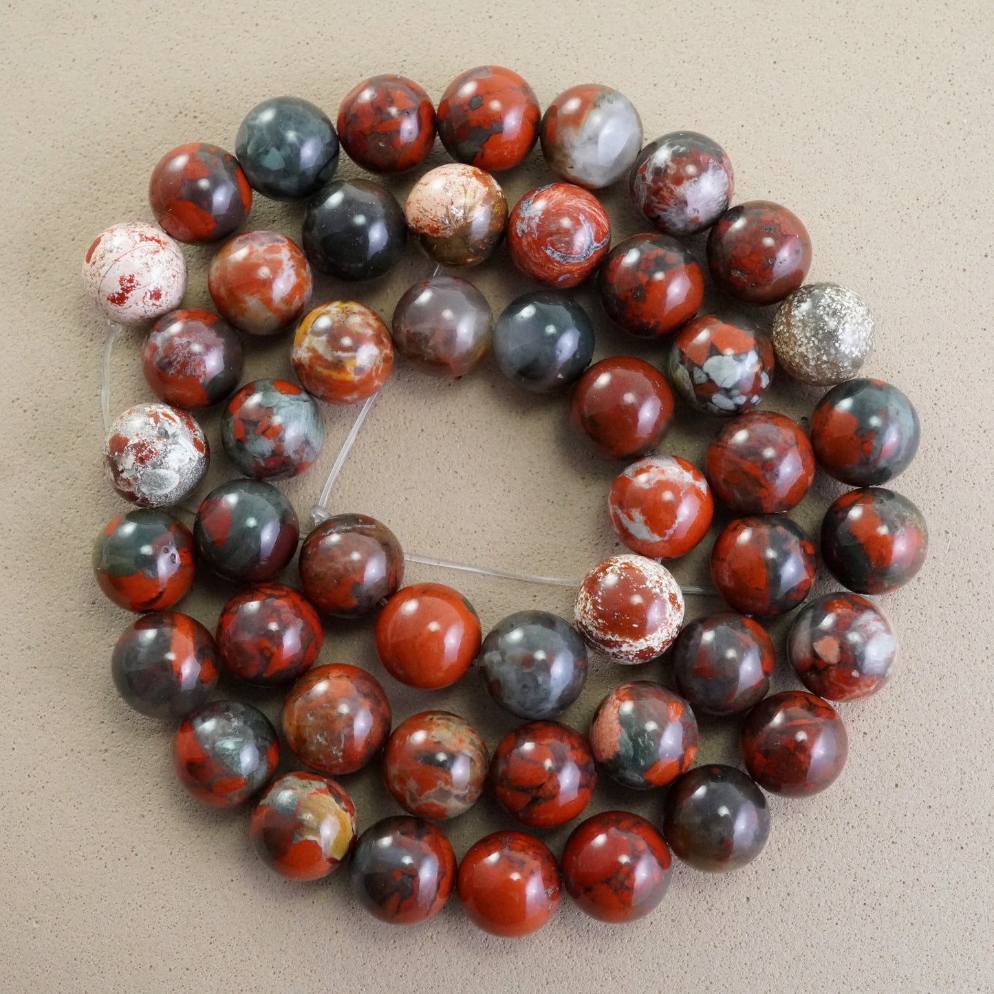 Poppy Jasper (Round)(Smooth)(6mm)(8mm)(10mm)(16"Strand)