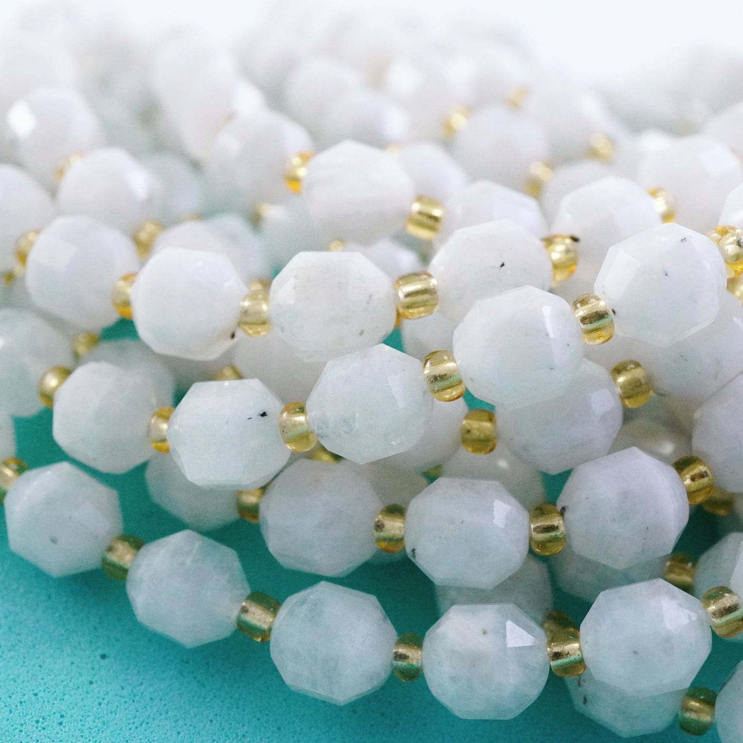 Rainbow Moonstone (Barrel)(Faceted)(8x7mm)(16"Strand)