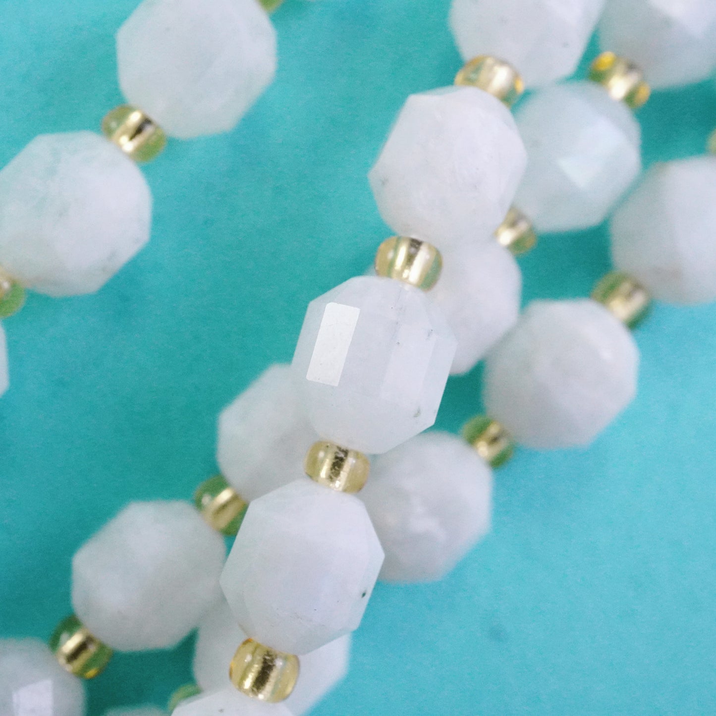 Rainbow Moonstone (Barrel)(Faceted)(8x7mm)(16"Strand)