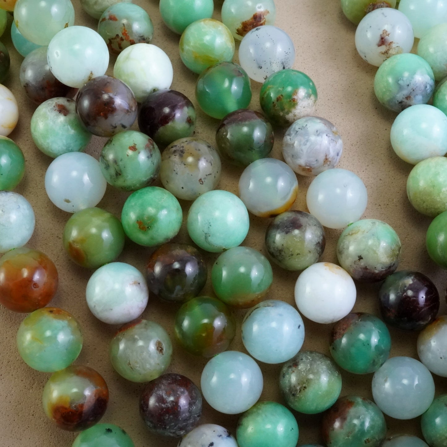 Chrysoprase (Round)(Smooth)(9mm)(12mm)(16"Strand)