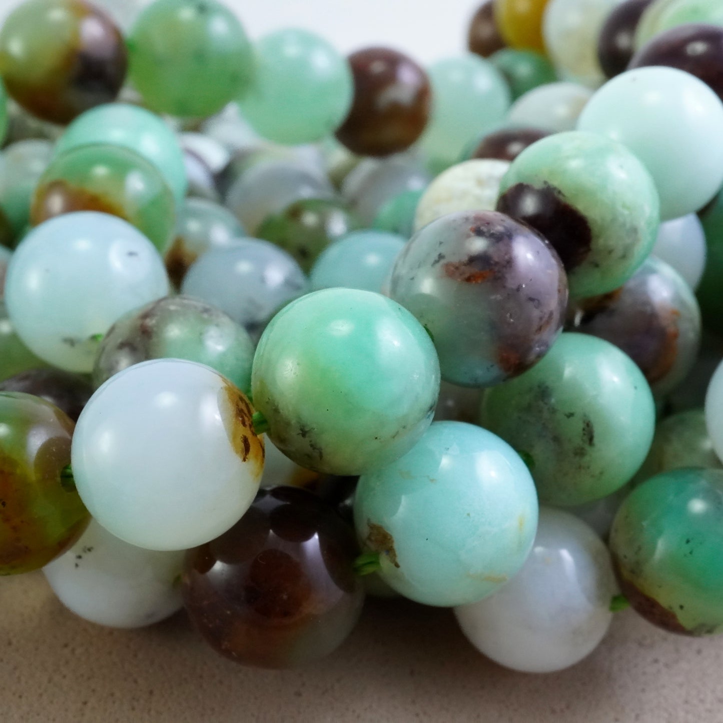 Chrysoprase (Round)(Smooth)(9mm)(12mm)(16"Strand)