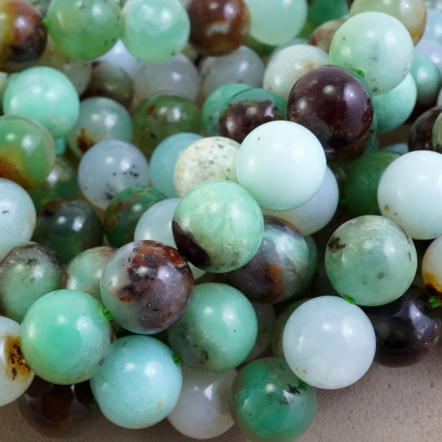 Chrysoprase (Round)(Smooth)(9mm)(12mm)(16"Strand)