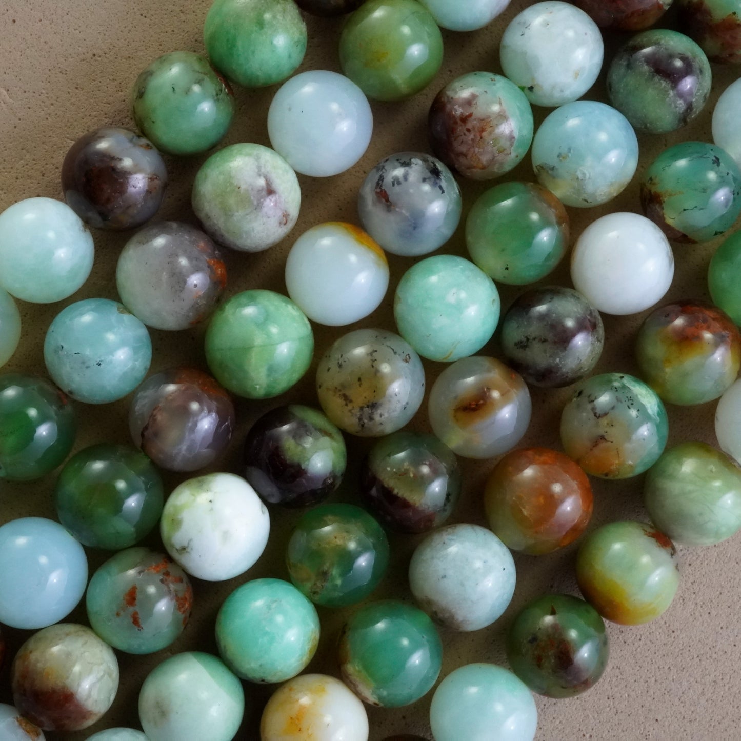 Chrysoprase (Round)(Smooth)(9mm)(12mm)(16"Strand)