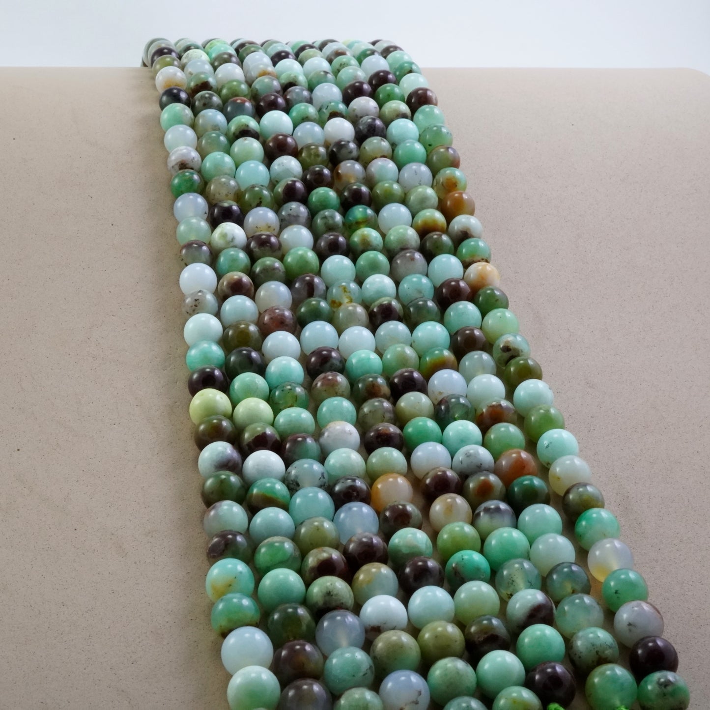 Chrysoprase (Round)(Smooth)(9mm)(12mm)(16"Strand)